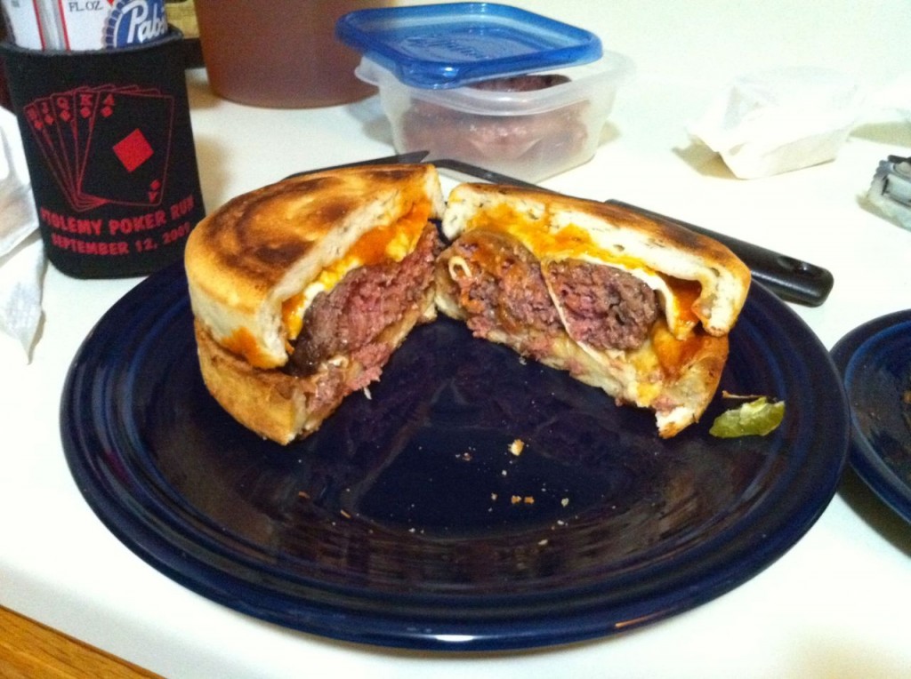 "hamburger sandwiched between two personal pizzas," from memphis